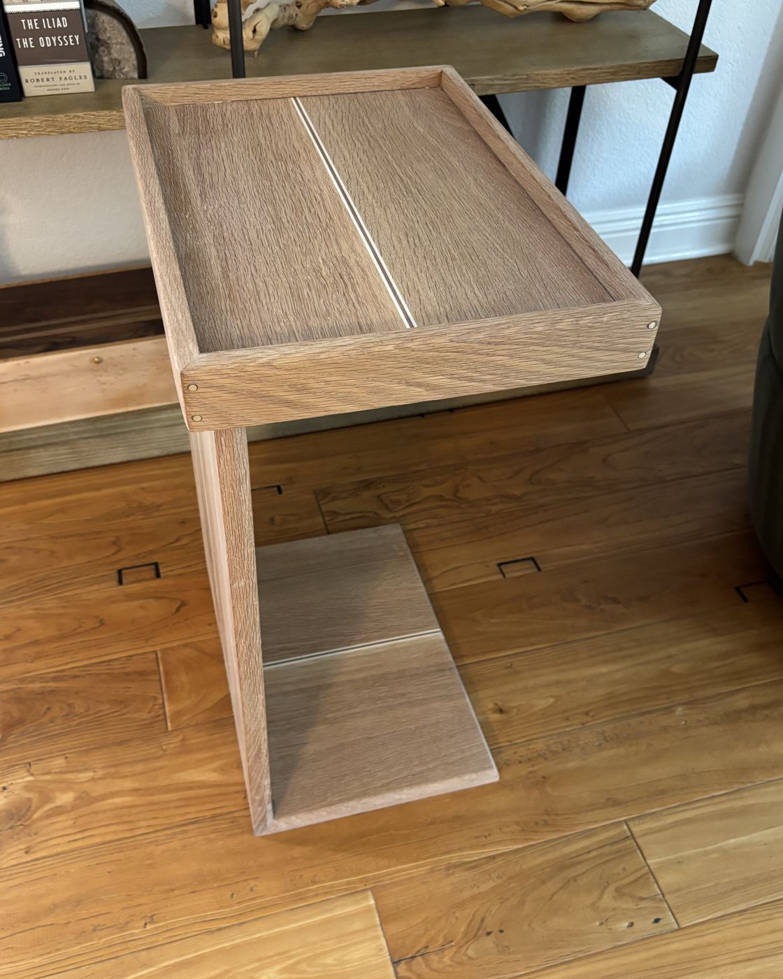 White oak C-shaped side table with a framed tray top